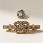 Chin & Shoulder Chanel Brooch