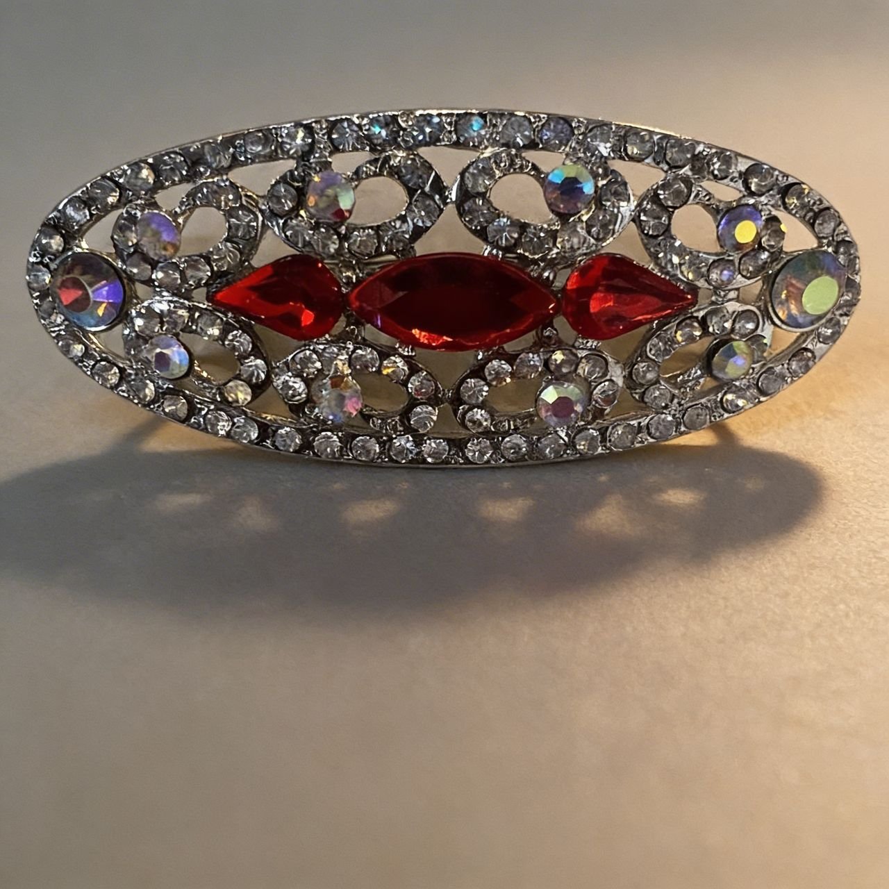 Red Chin & Shoulder Brooch