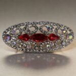 Red Chin & Shoulder Brooch